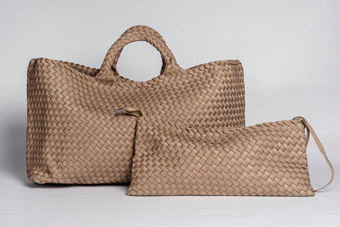 Large and small woven bags in light tan, made of durable material, perfect for stylish storage.