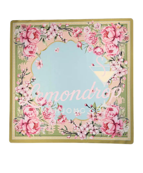 Floral design with pink flowers and green leaves on a light blue background
