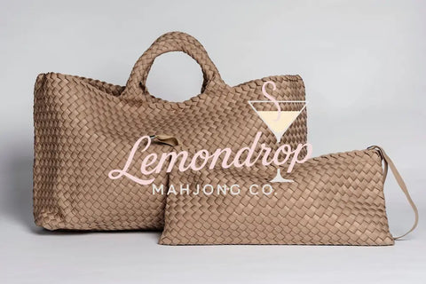 Large and small woven bags in light tan, made of durable material, perfect for stylish storage.