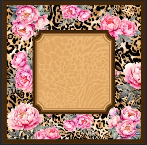 a square frame with pink flowers on a leopard print