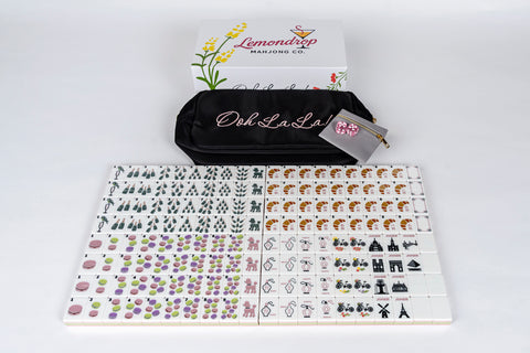 Lemondrop Mahjong set with colorful tiles, black carry bag, and gray pouch, ideal for game enthusiasts.