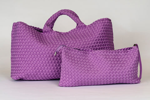 Large and small woven purple bags made of durable material, ideal for stylish storage and travel.