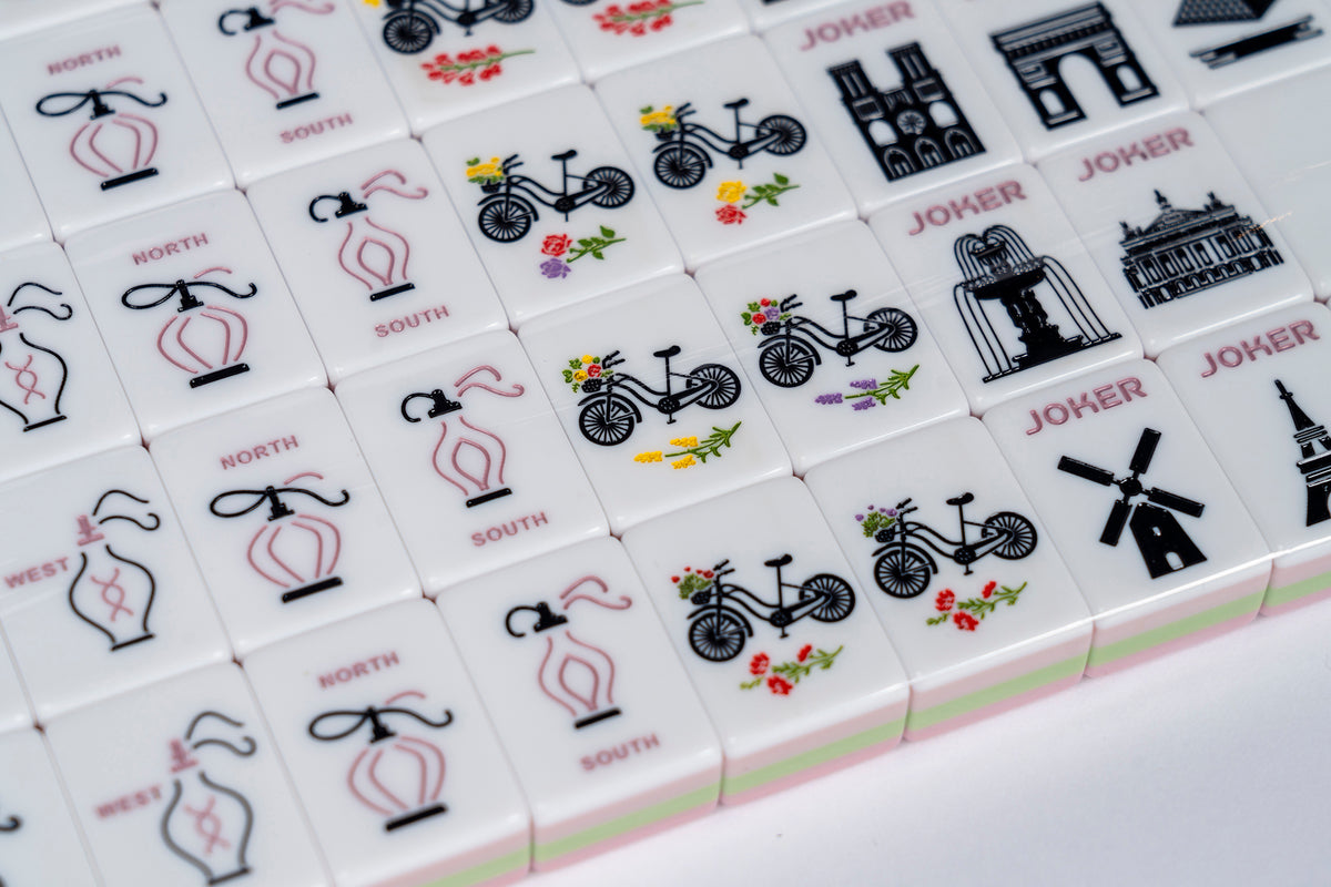 Set of tiles with various symbols on a white background