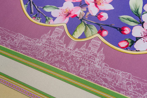 Beautiful floral fabric design with pink blossoms and purple background, perfect for home decor projects.