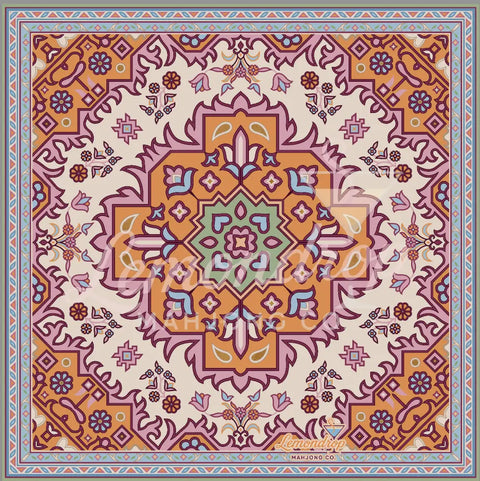 a colorful square pattern on a rug