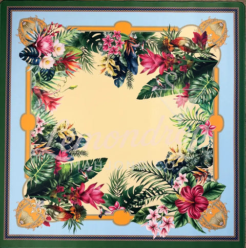 Decorative square with tropical floral and leaf design on a light gold background